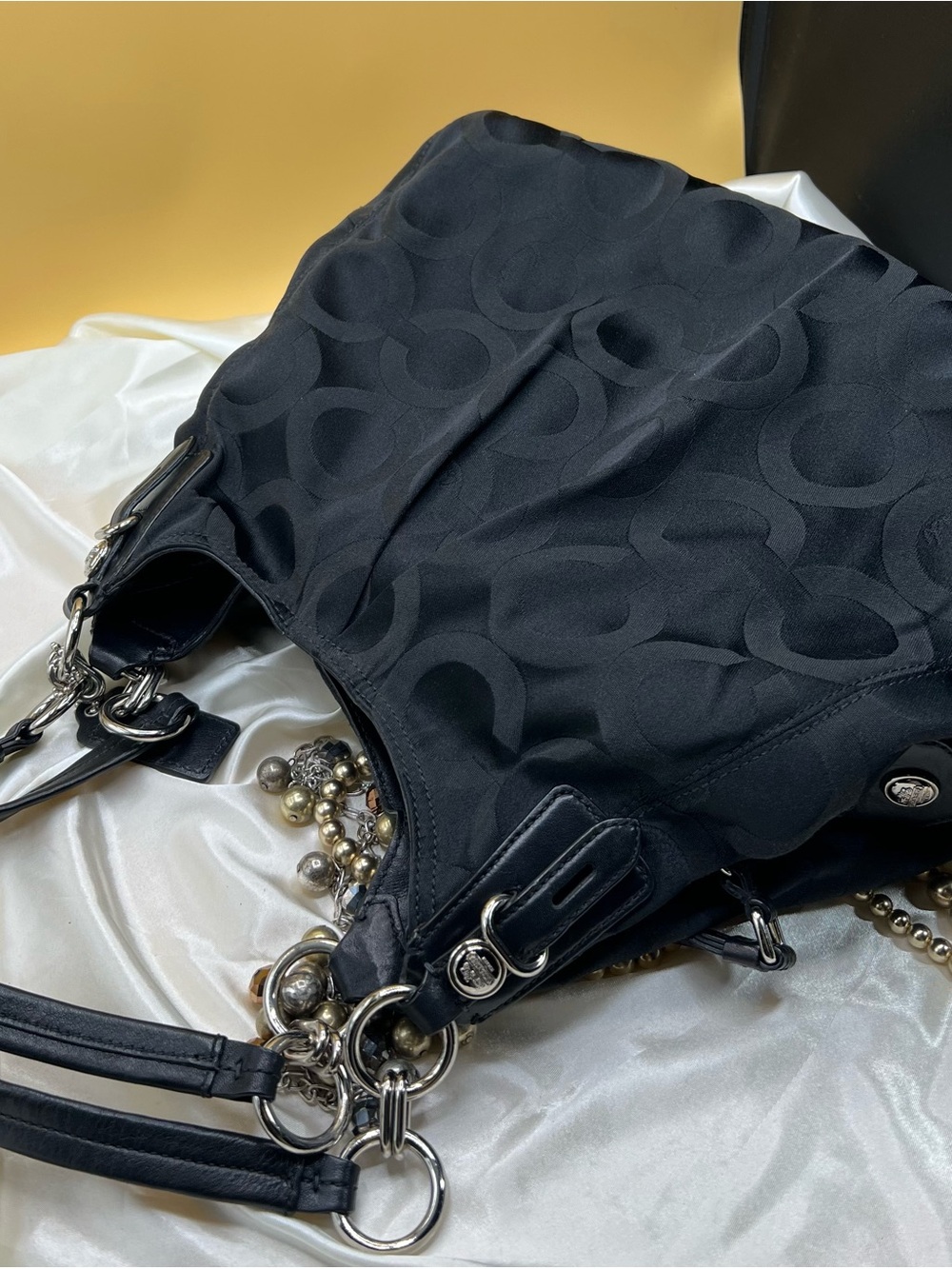 COACH Madison Large Black Coach Pattern Shoulder Bag.